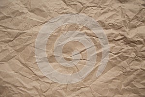 Brown rough crumpled recycled paper texture photo