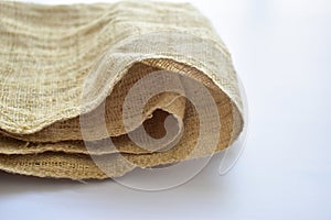 brown sackcloth texture background, folded burlap fabric textile for design