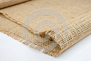 Brown sackcloth woven texture background in natural pattern