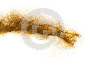 Brown sand explosion against white background.