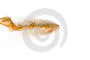 Brown sand explosion isolated on white background. Abstract sand cloud backdrop
