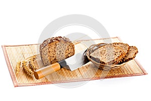 Brown seed bio bread isolated on white background food