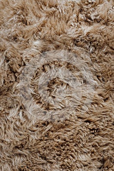 Brown sheepskin fur texture background