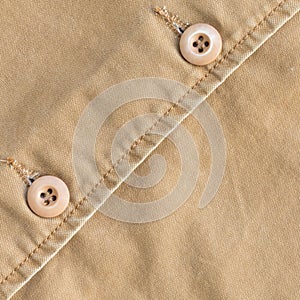 Brown shirt background with stitch seam textile