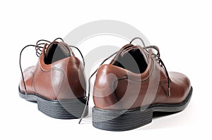 Brown shoes on white background.