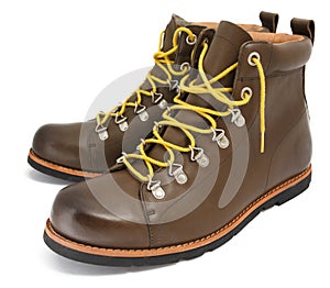 Brown shoes with yellow laces