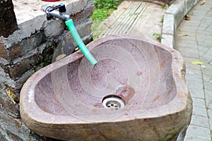 Brown sink made of stone