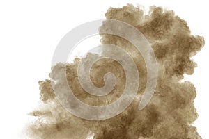Brown smoke on white background. Brown dust particle exhale in the air photo