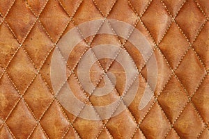 Brown sofa background with checkerboard pattern