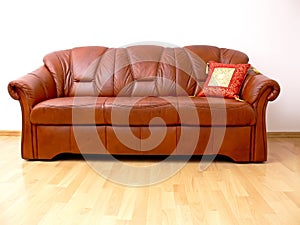 Brown sofa with orient pillow