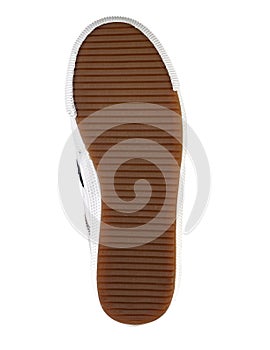 Brown sole of a shoe on a white background