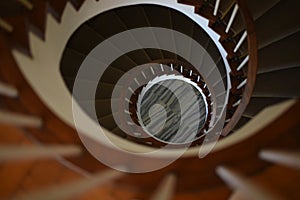 Brown spiral staircase of the SÃ£o Francisco hotel in Penedo, Alagoas, Brazil, in the year 2020