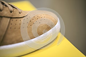 Brown Sport shoes detail photo