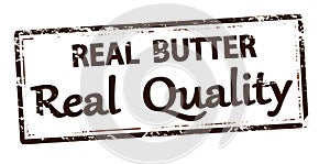 Brown stamp with text Real butter
