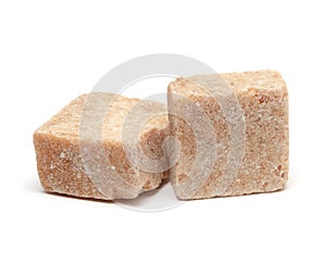 Brown sugar cube isolated on white background