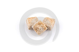 Brown sugar cubes isolated