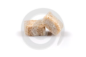 Brown sugar cubes isolated