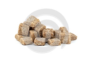 Brown sugar cubes isolated on white background
