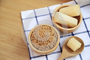 Brown sugar powder in bowl from fresh organic sugar cane for being cooking ingredients for healthy eating. selective focus