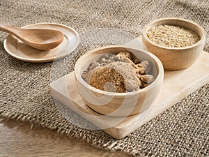 Brown sugar and wheat germ in wooden bowl