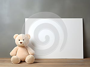 brown teddy bear with a blank sign with space for copy