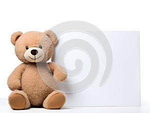 brown teddy bear with a blank sign with space for copy