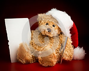 Brown Teddy Bear Writing a Letter to Santa Claus