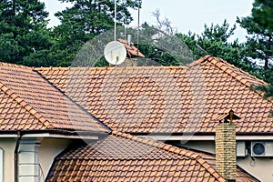 Brown tile on the roof of a large private house