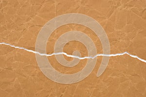 Brown torn paper with copy space background texture