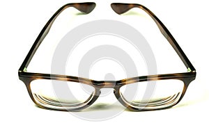 Brown tortoiseshell glasses isolated on a white background. Amazing horn rimmed eyeglasses