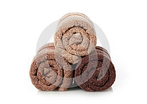 Brown towels rolled up