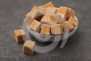 Brown unrefined cane sugar cubes