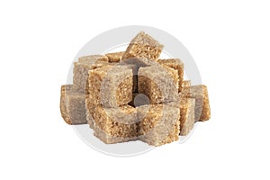 Brown unrefined cane sugar cubes isolated on white background. Macro shot heap refined sugar cubes isolated