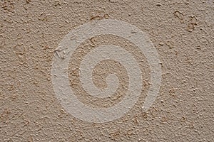 Brown wall with cracked paint surface. Background or texture