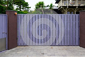 Brown wall home and portal wood grey natural wooden gate of private house