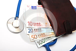 Brown wallet and stethoscope