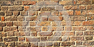 Brown weathered old brick wall background