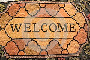 Brown welcome doormat close up