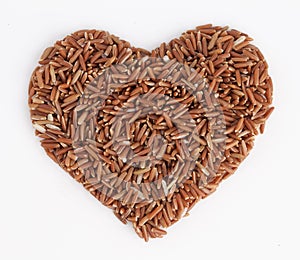 Brown and white rice with heart shape