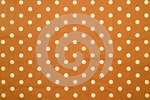 Brown white round dot patterned fabric texture