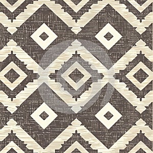 Brown and white rug with diamond pattern