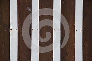 Brown and white wooden wall, striped background of wooden plank