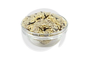 brown and wild rice in a glass container
