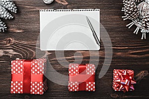 Brown wood background with texture. Cones and decorative walnuts. Christmas Fellowship, New Year and Xmas.