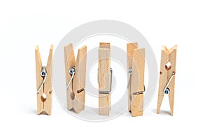 Brown wood clothes peg or clothespin on white background. - Image