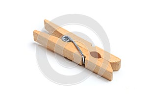 Brown wood clothes peg or clothespin on white background. - Image