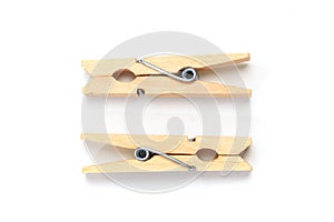 Brown wood clothes peg or clothespin on white background. - Image