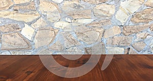 Brown wood table top planks on white blurred stone wall background from building hallway - can be used for display or montage your