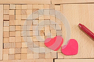 Brown wooden blocks with hearts
