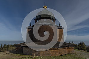 Brown wooden old chapel on Radhost hill in Beskydy mountains